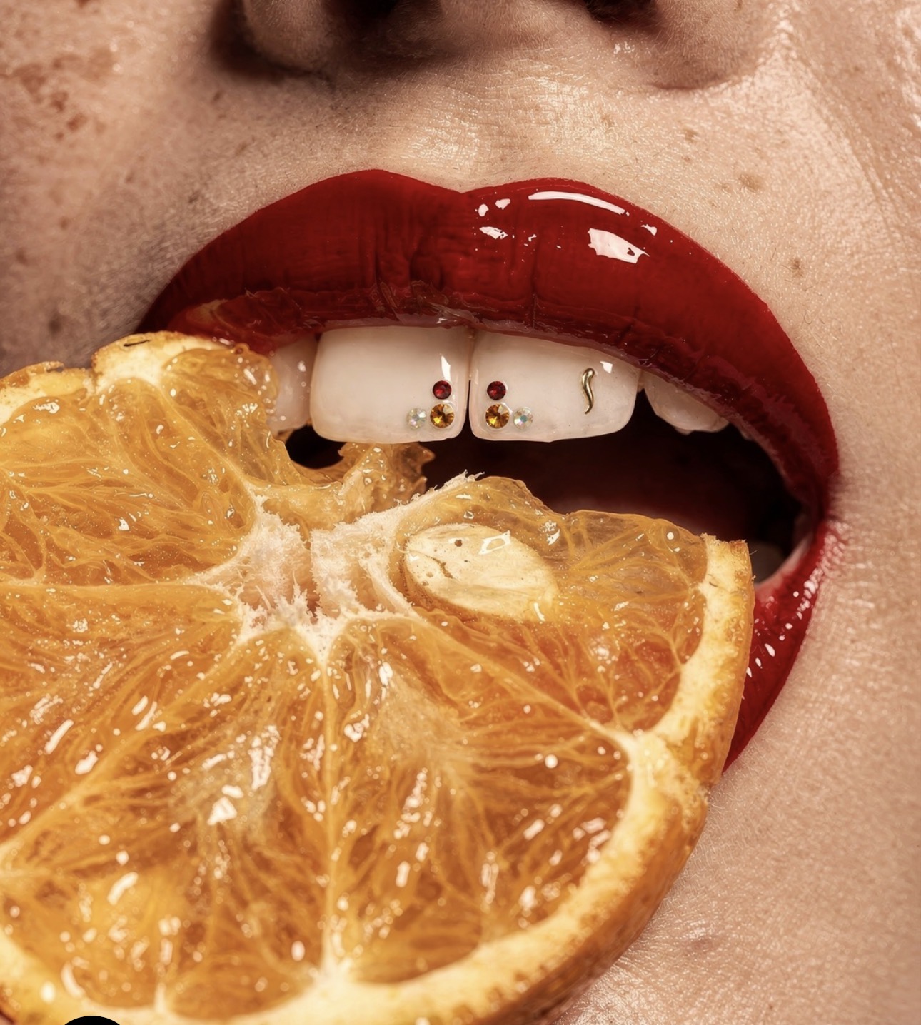 Sparkling diamond tooth gem on a smile